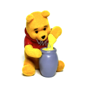Disney Winnie the Pooh Mini Figure - Winnie sitting with a pot of honey, 1 piece, 5 cm