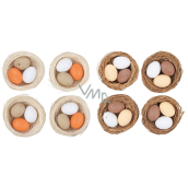 Plastic eggs in nest 5,5 cm 4 pieces different colours