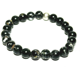 Pearl black elastic synthetic bracelet, ball 8 mm / 16 - 17 cm, symbol of femininity