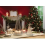 Yankee Candle Arctic Forest reindeer candlestick sitting on a tea candle