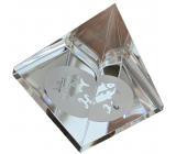 The clear glass pyramid with the moon sign Pisces