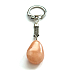 Calcite Trommel pendant keychain natural stone, approx. 10 cm