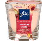 Glade Champagne Cheers with the scent of champagne and fresh peach scented candle in glass, burning time up to 38 hours 129 g